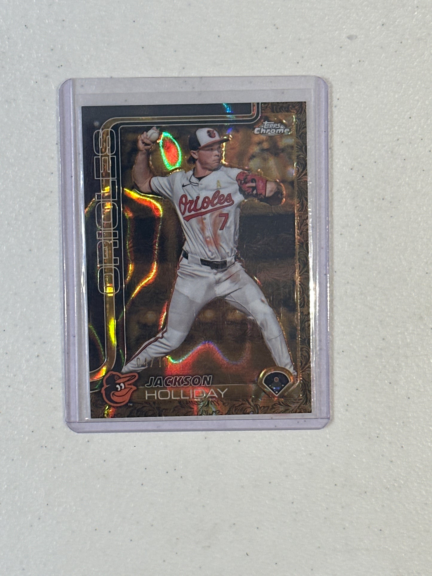 Singles: Baseball Cards- 2025 Topps Gilded Jackson Holliday Black Gold Raywave /10