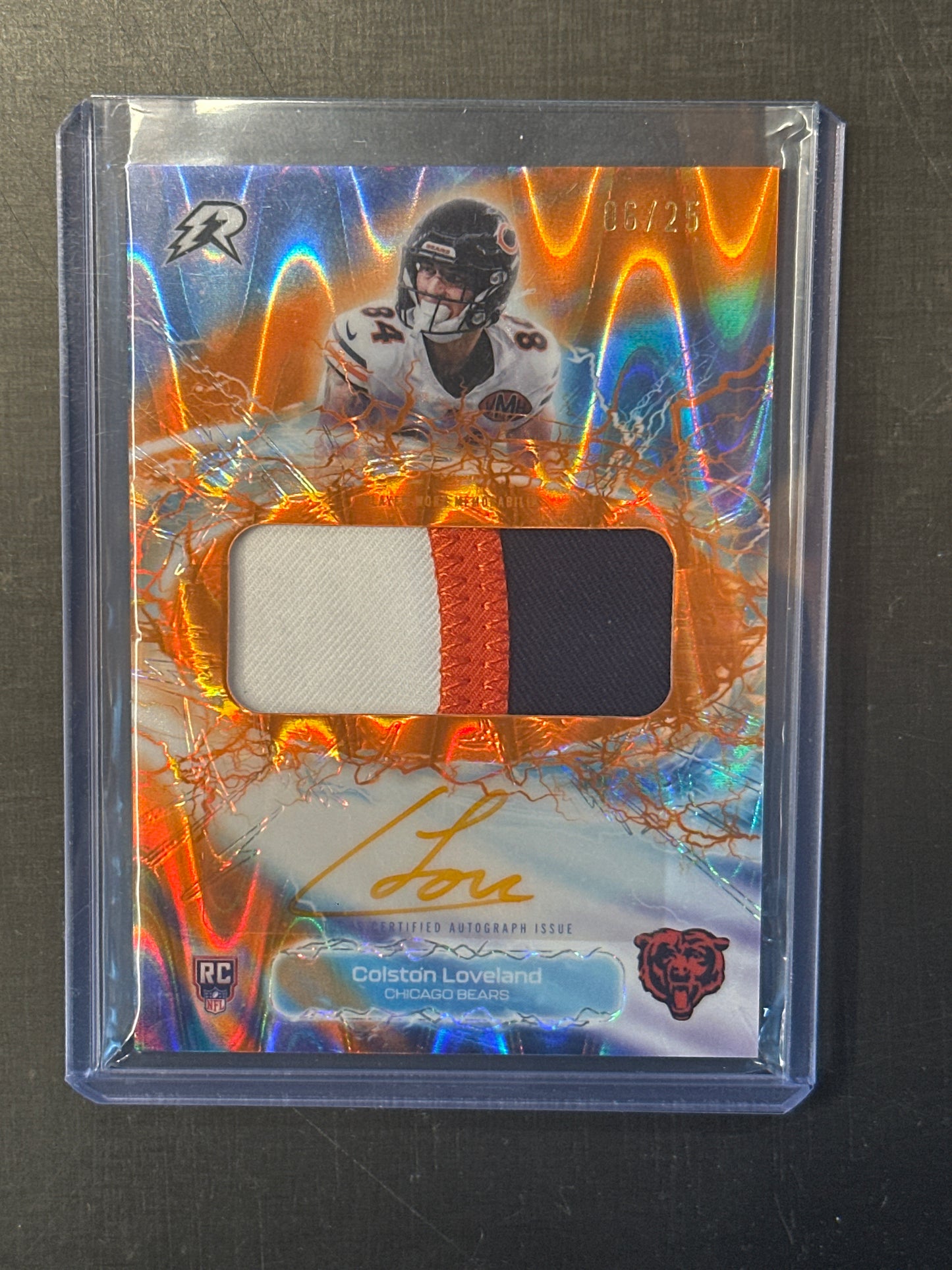 Singles: Football Cards- 2026 Topps Resurgence Colston Loveland Orange Ink Patch Auto /25