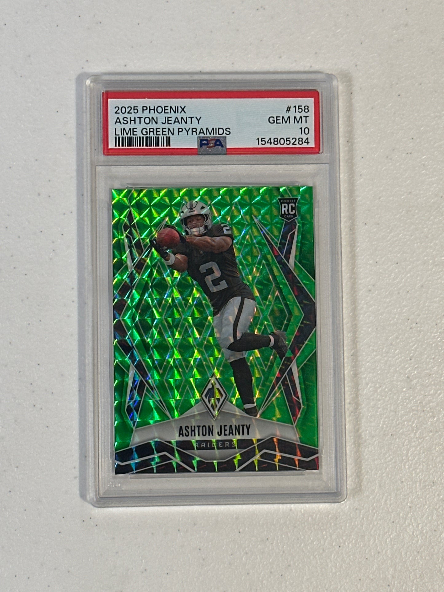 PSA: Football Cards- 2025 Phoenix Ashton Jeanty Lime Green Pyramids /285 PSA 10