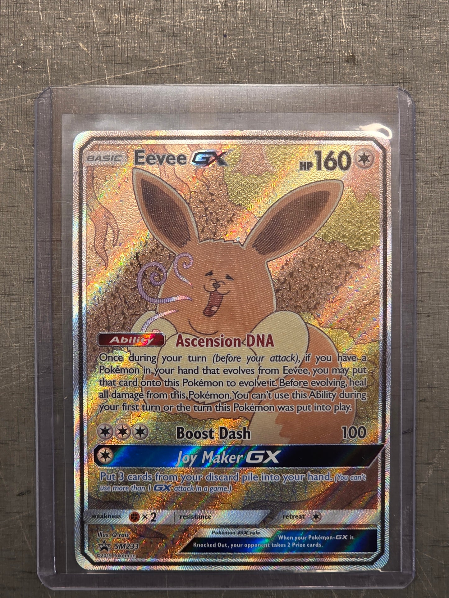 Singles: Pokemon Singles - Eevee GX Promo SM233