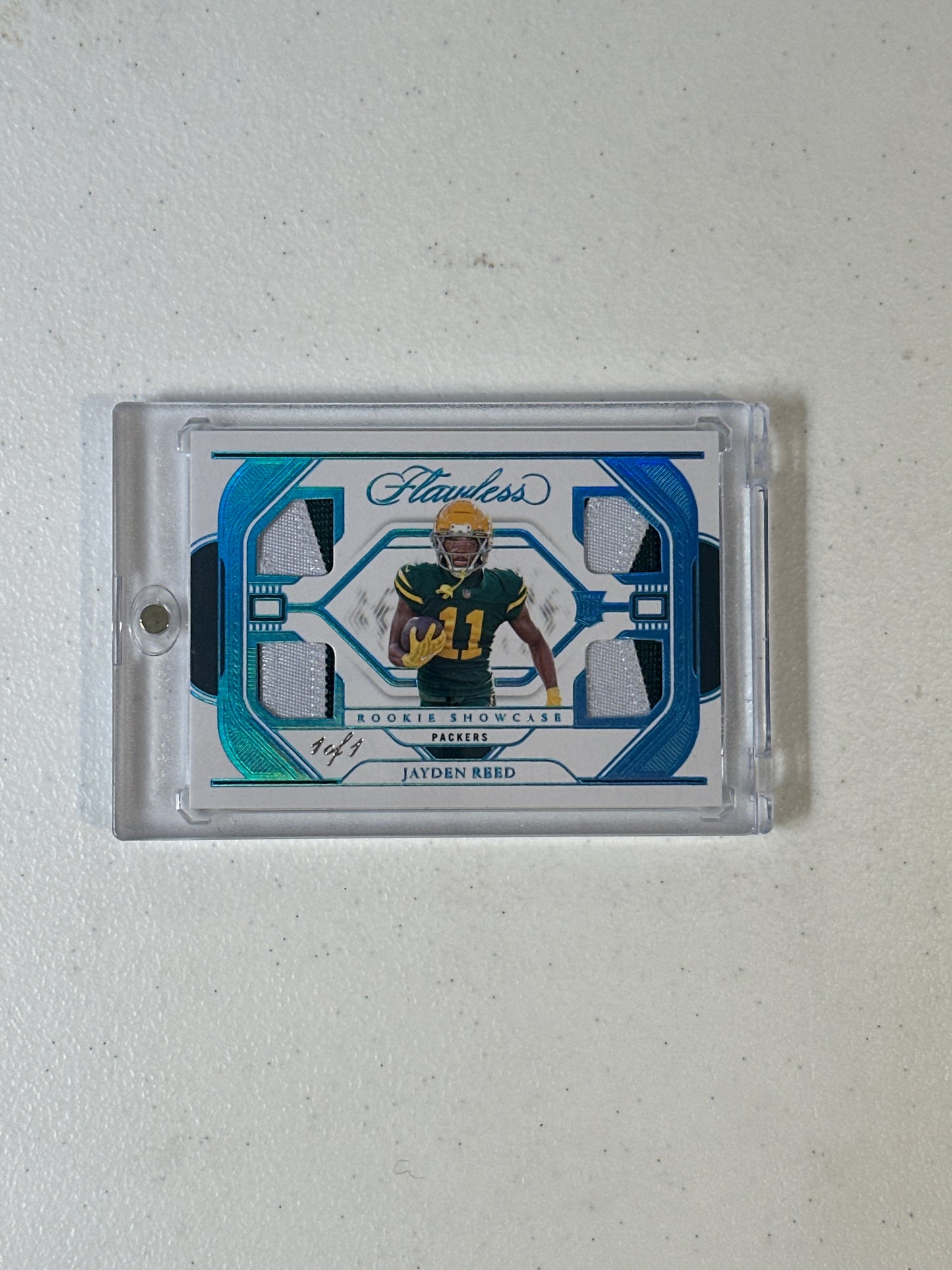 Singles: Football Cards- 2023 Flawless Jayden Reed Rookie Showcase Quad Patch 1/1
