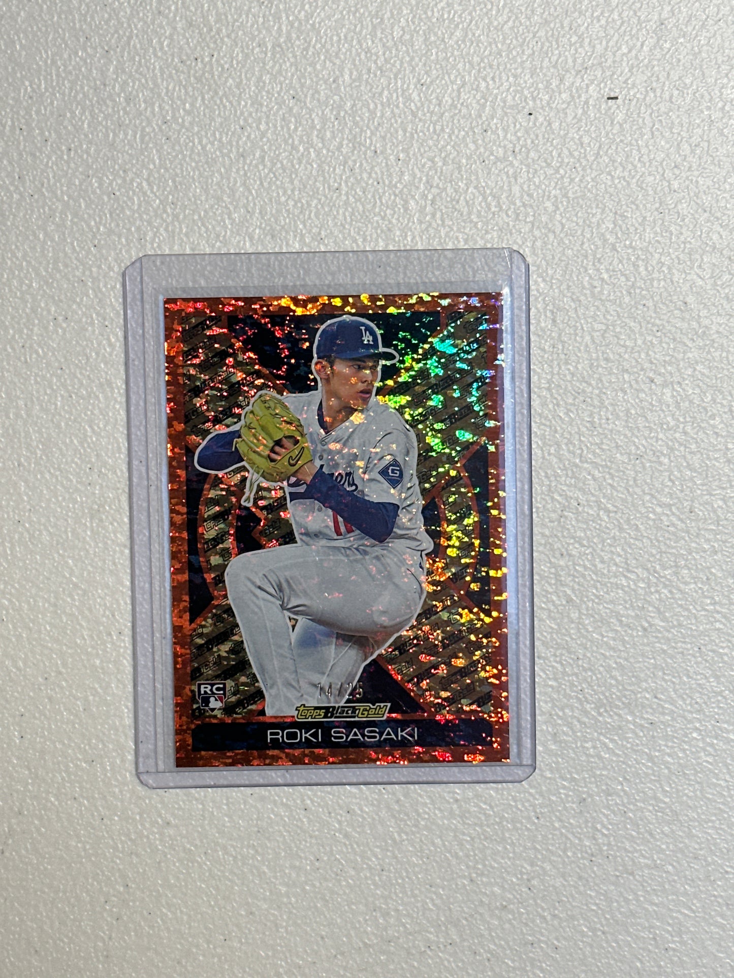 Singles: Baseball Cards- 2025 Topps Roki Sasaki Topps Black Gold 14/25