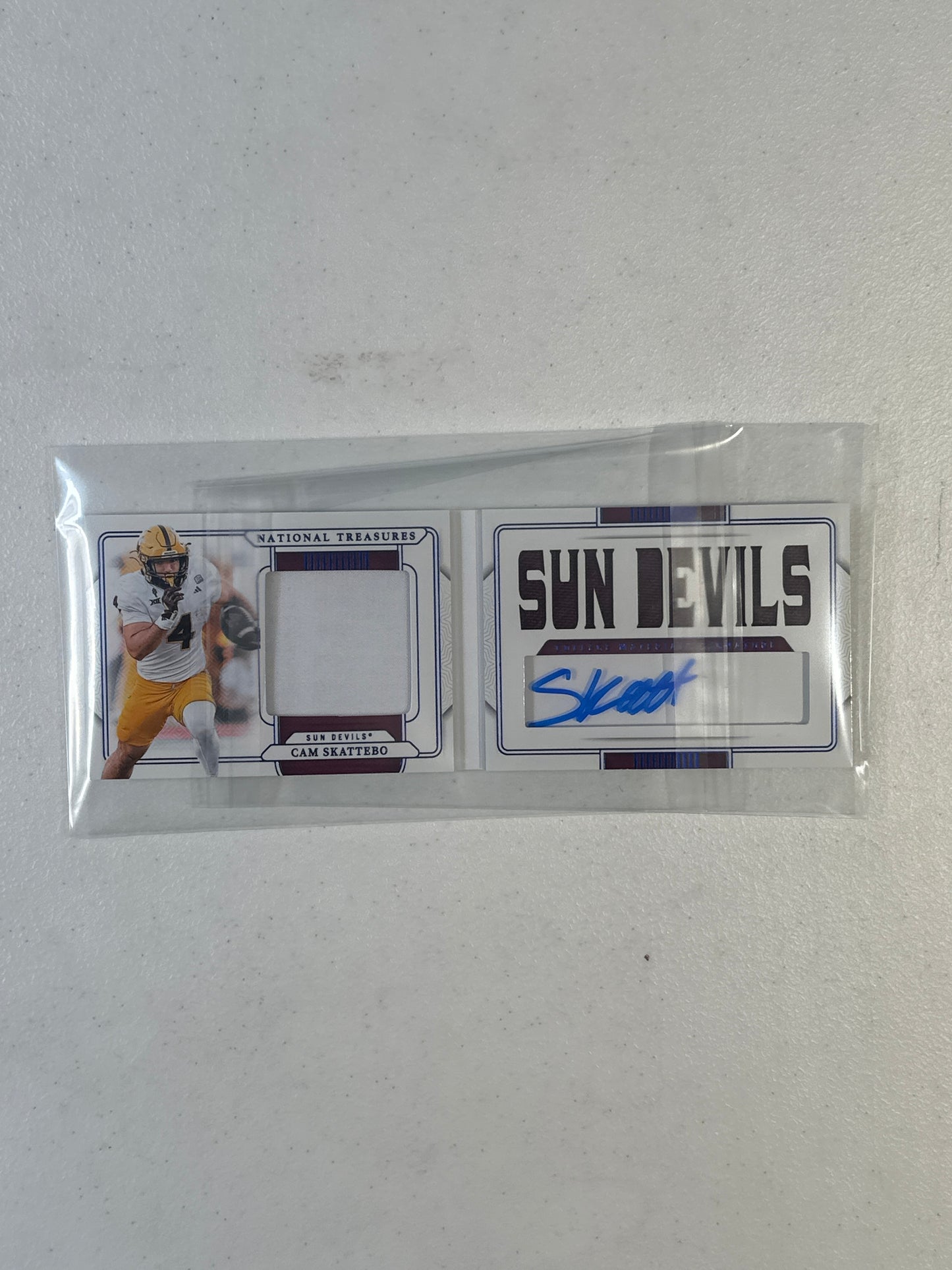 Singles: Football Cards- 2025 National Treasures Collegiate Cam Skattebo Booklet Patch Autograph /75