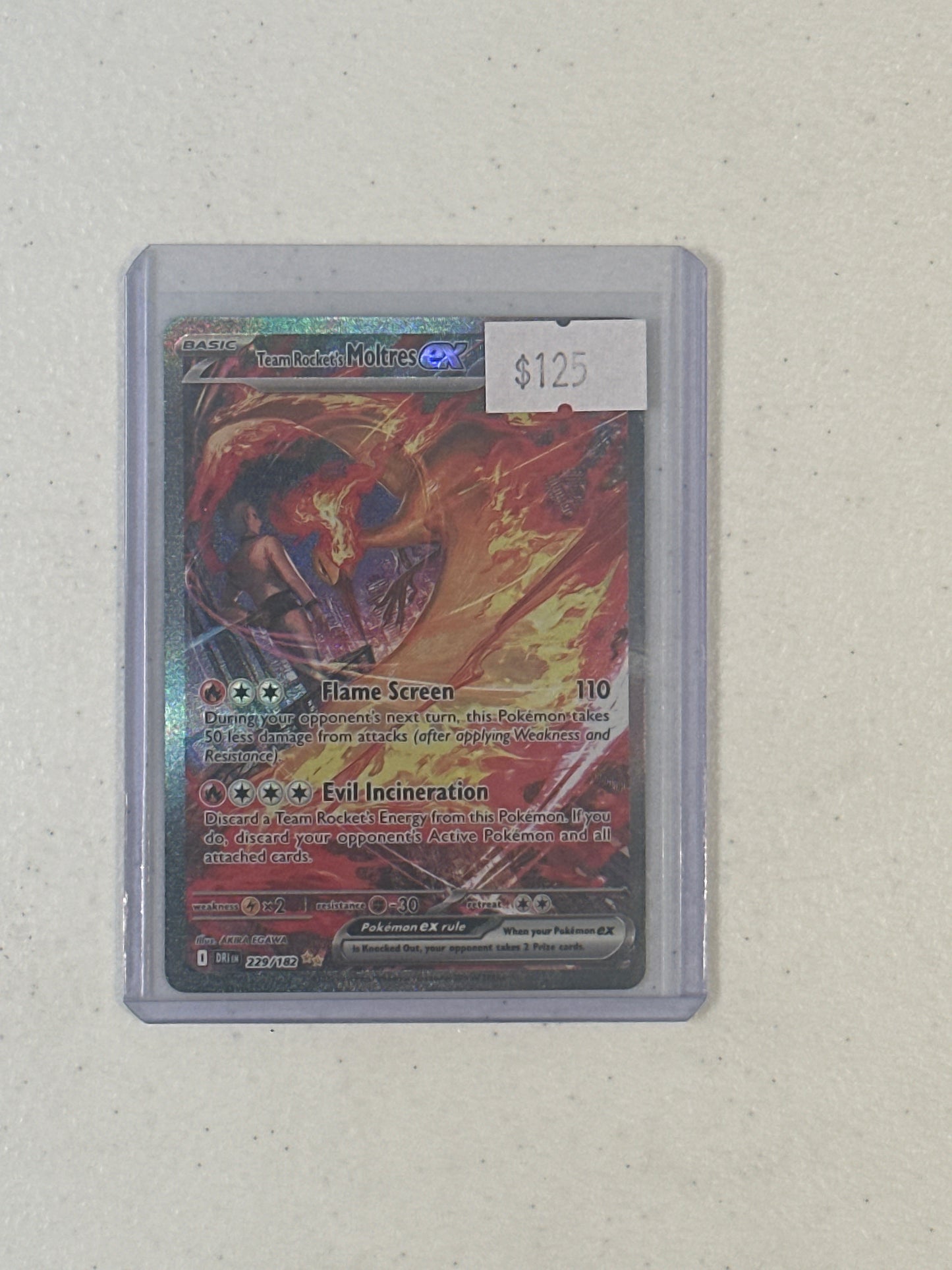 Singles: Pokemon Cards- Team Rocket’s Moltres ex 229/182