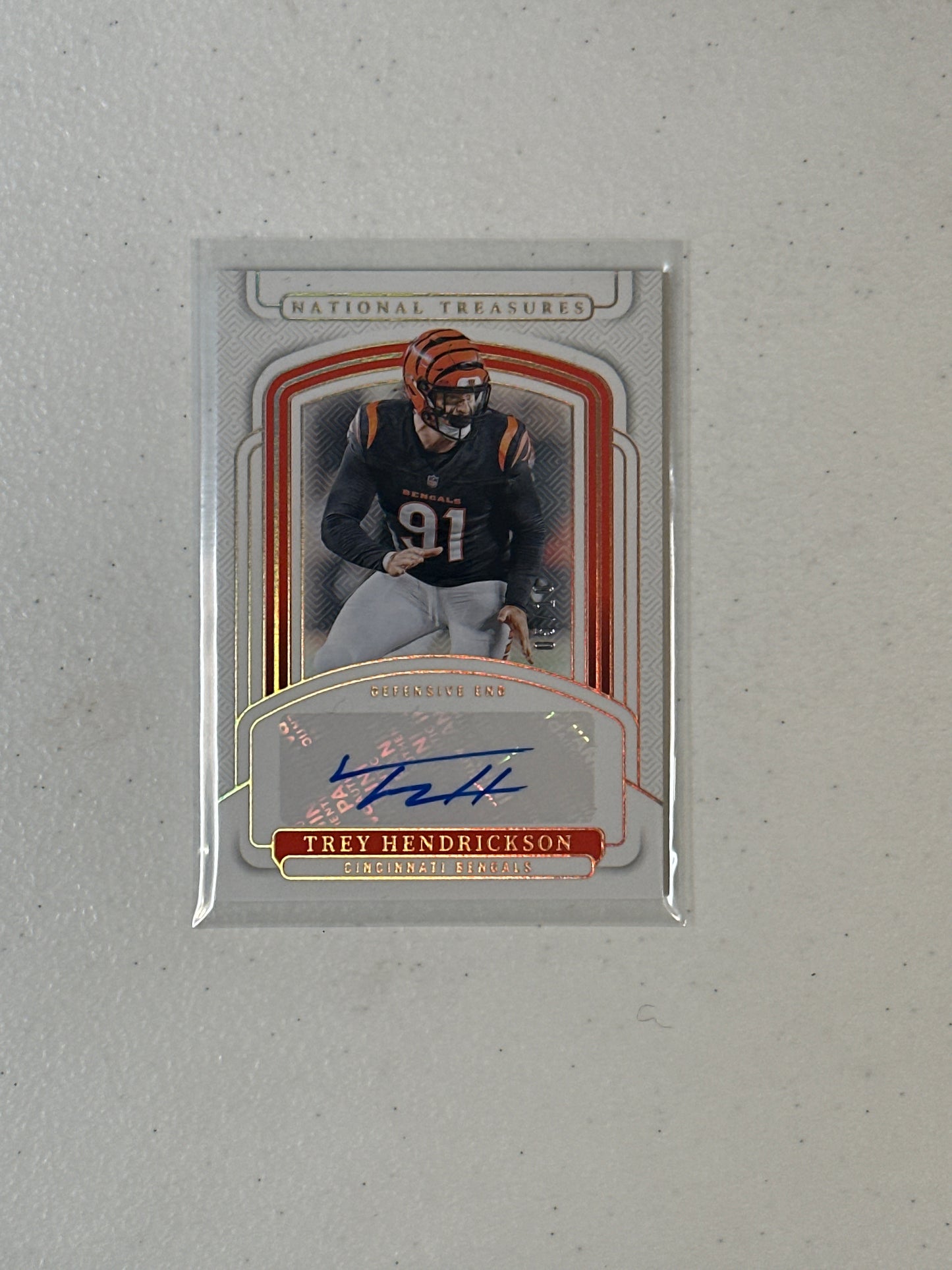 Singles: Football Cards- 2024 National Treasures Trey Hendrickson Autograph /10