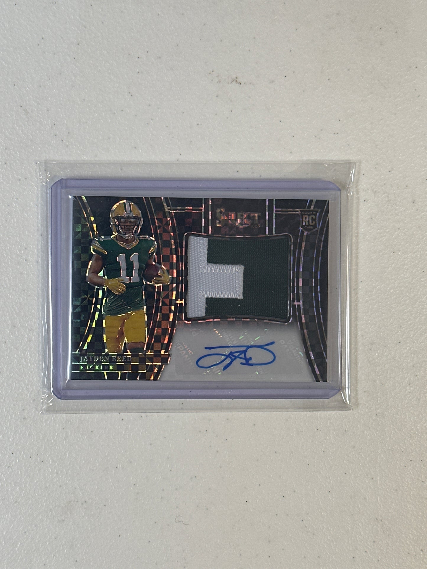 Singles: Football Cards- 2023 Select Jayden Reed Patch Autograph 1/1
